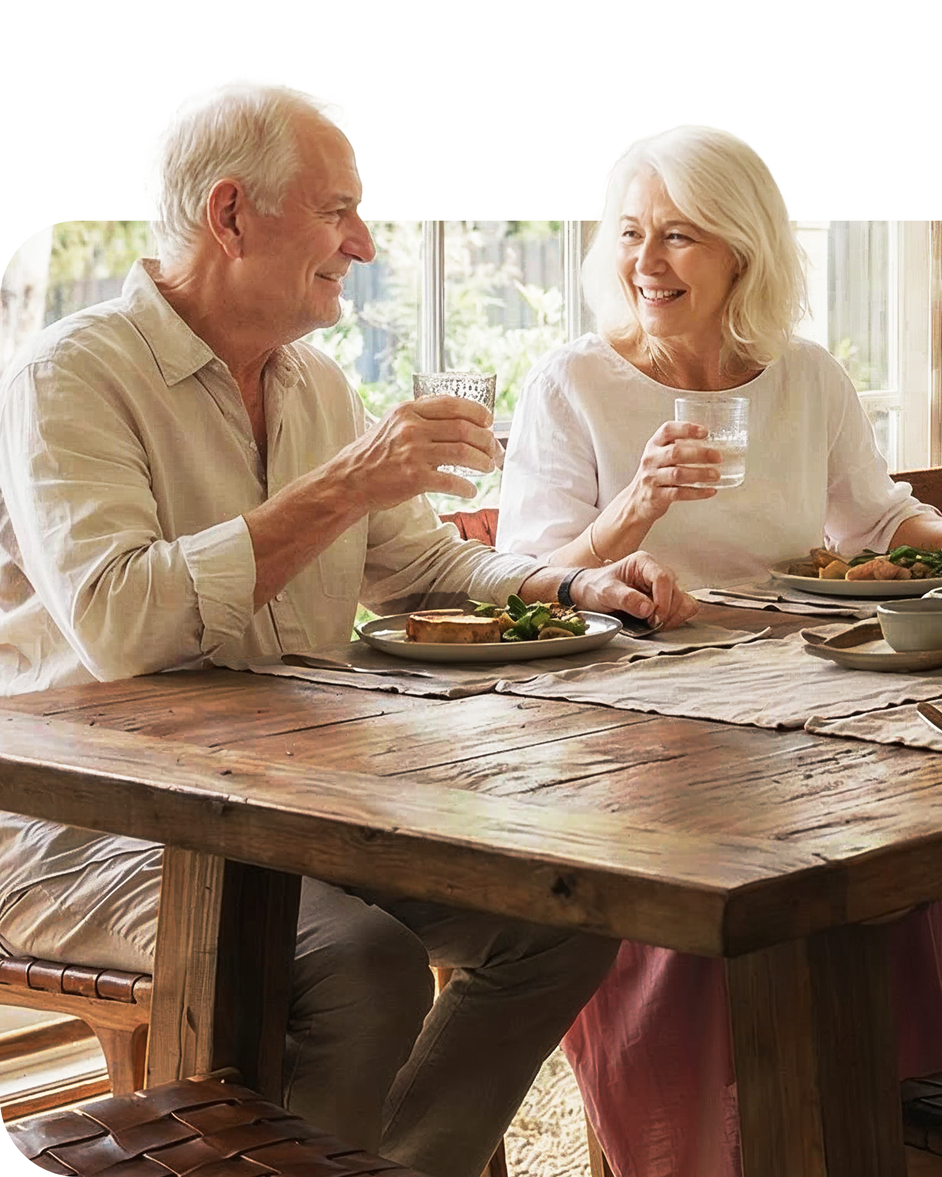 Two people having dinner, each with a glass of water
